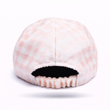 Backwards view of pink and white gingham hat background