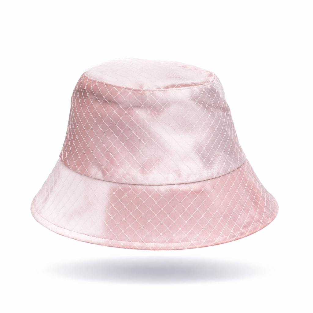 Pink bucket hat with a textured pattern on a white background