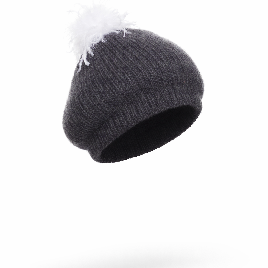 Charcoal knit beanie with white ostrich pom-pom on a white background