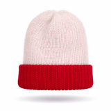 Knitted beanie with white top and red band on a white background