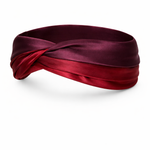 Burgundy, ruby, and aubergine satin headband on a white background