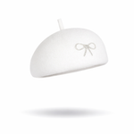White beret with a decorative bow on a white background