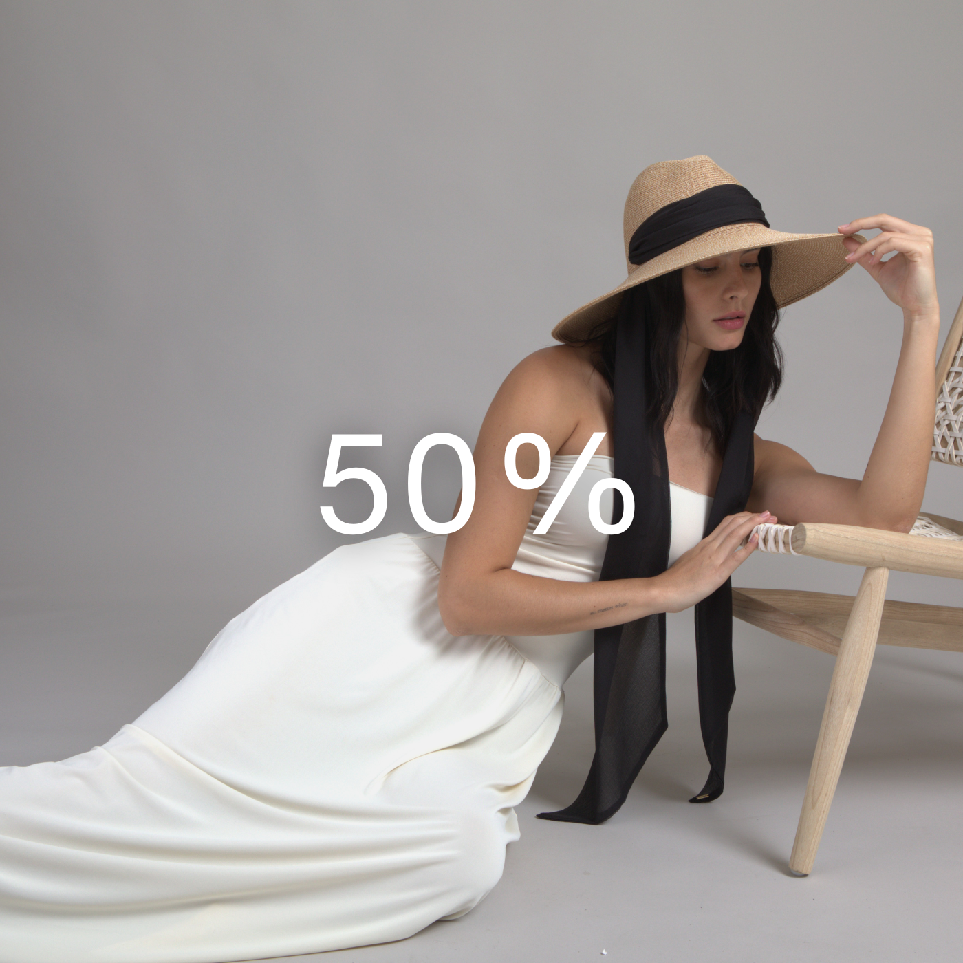 Bestselling Eugenia Kim headbands and statement hats showcased on model, included in the 50% Off Black Friday Insider sale.