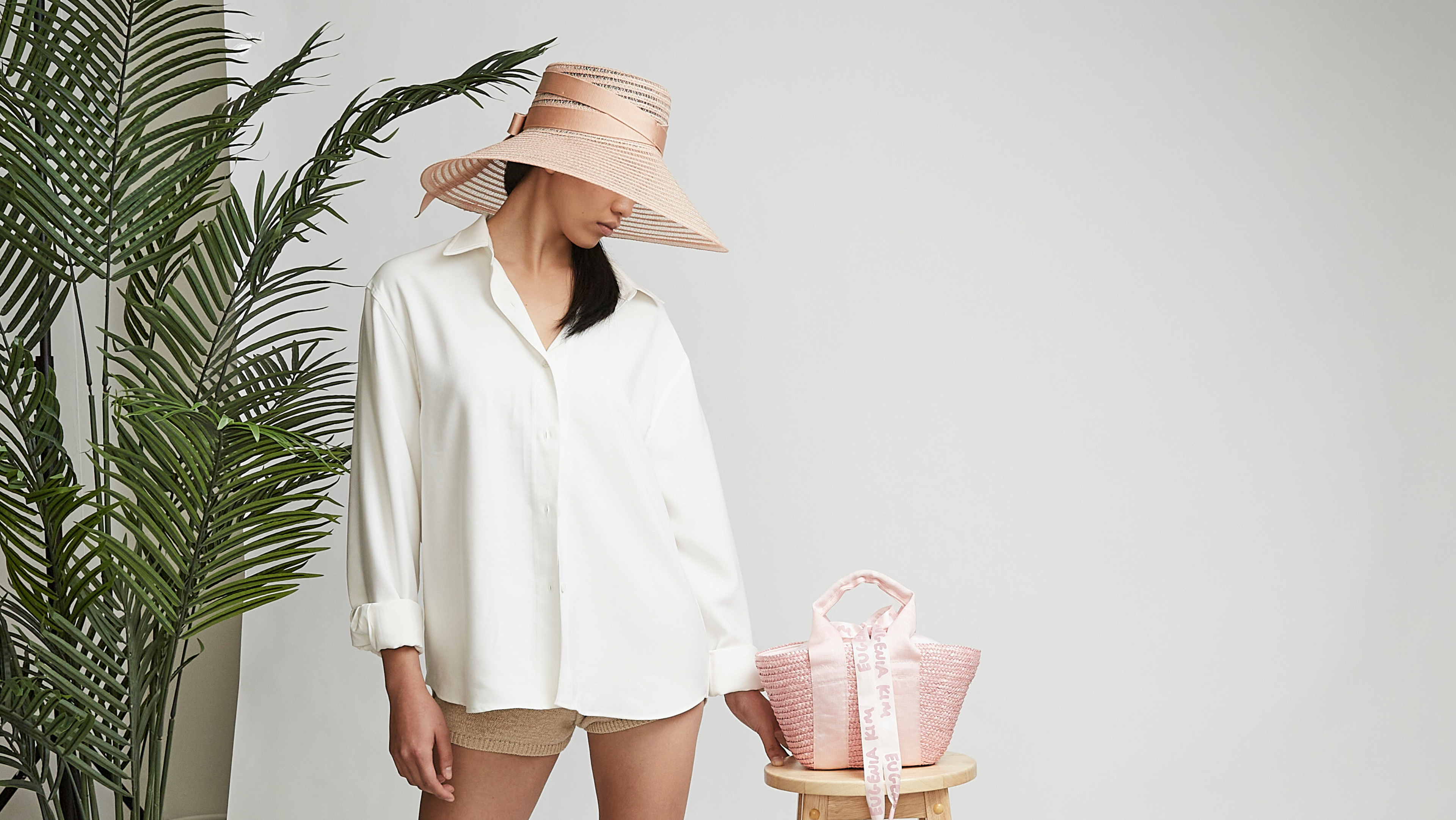 Spring Summer Collection image model with hat and bag