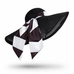 Black sun hat with a striped scarf on a white background