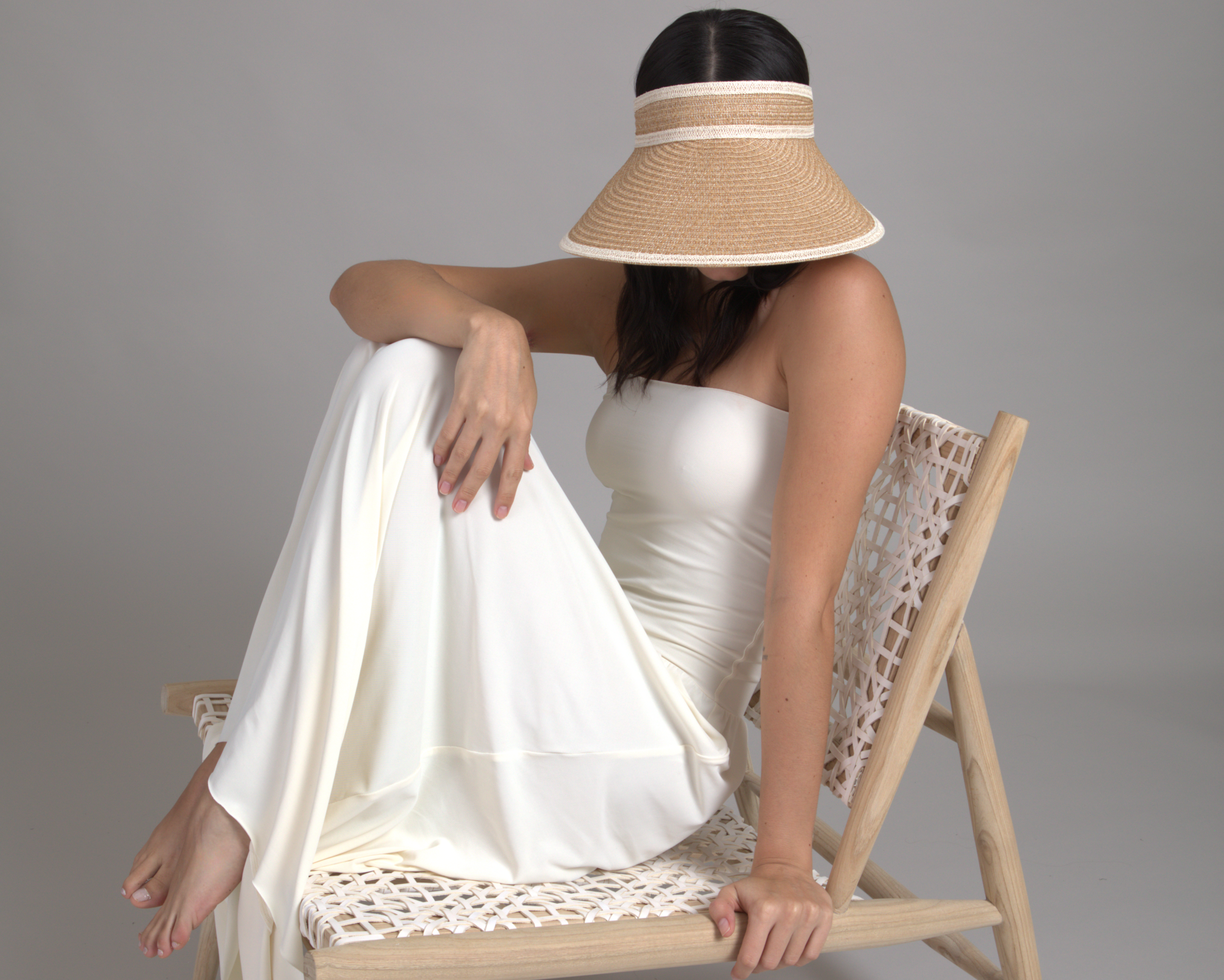 Eugenia Kim Trixie Visor in natural straw and ivory trim — wide-brim sun visor hat for women, summer accessory, luxury resort style.