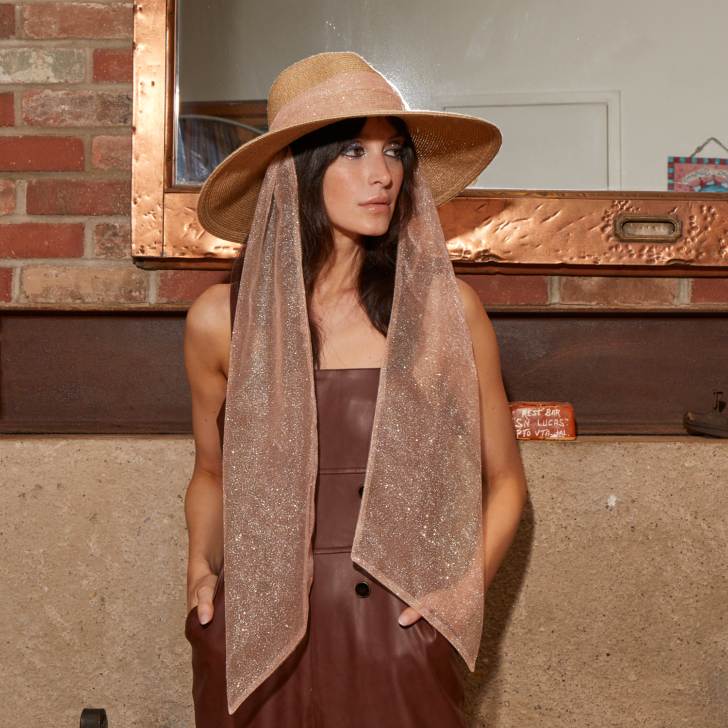 Eugenia Kim Cassidy packable fedora in sand/blush side view on model