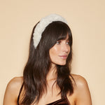 Eugenia Kim Dora headband in winter white side view on model