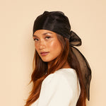 Profile view of Gigi headscarf on model