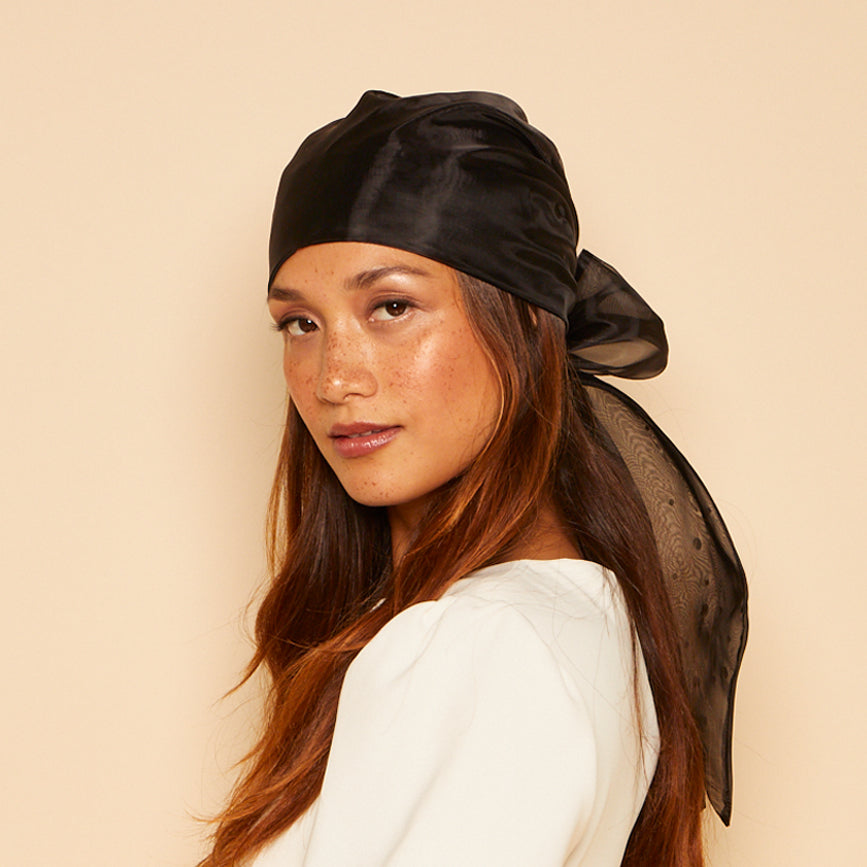 Profile view of Gigi headscarf on model