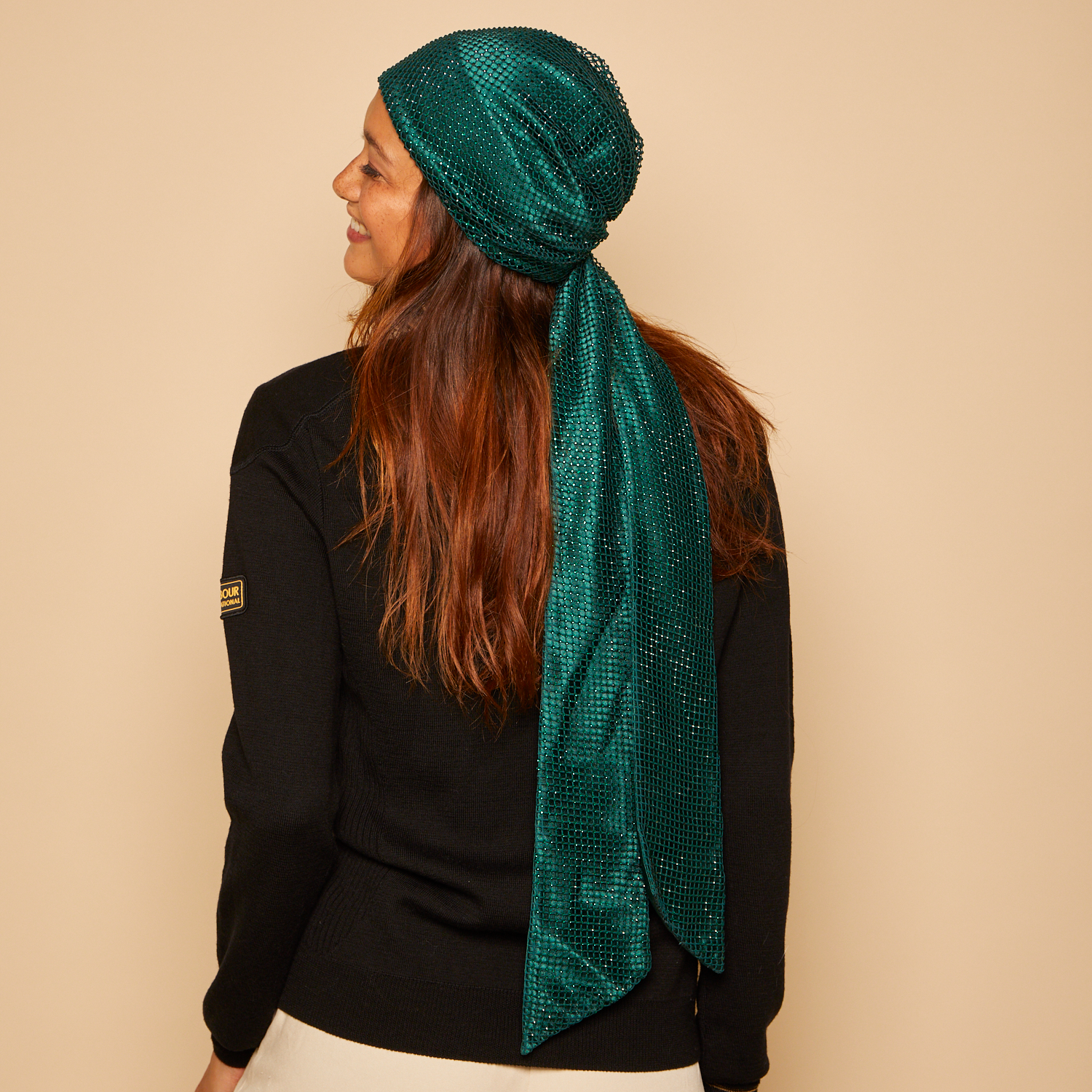 Eugenia Kim Gigi headscarf in emerald crystal back view on model