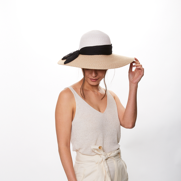 Eugenia Kim Honey packable fedora in bone/sand with black scarf front view on model