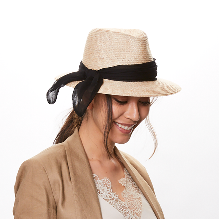 Eugenia Kim Lillian packable fedora in natural hemp side view on model 