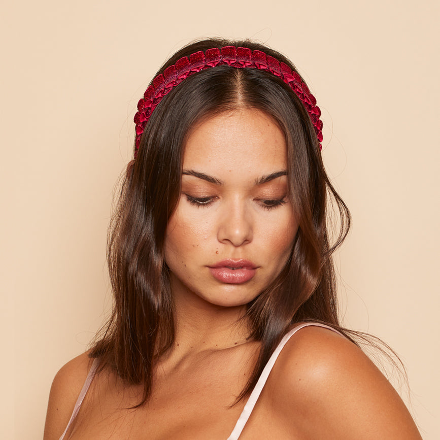 Front view of Rafaela pleated headband in red ombre. 