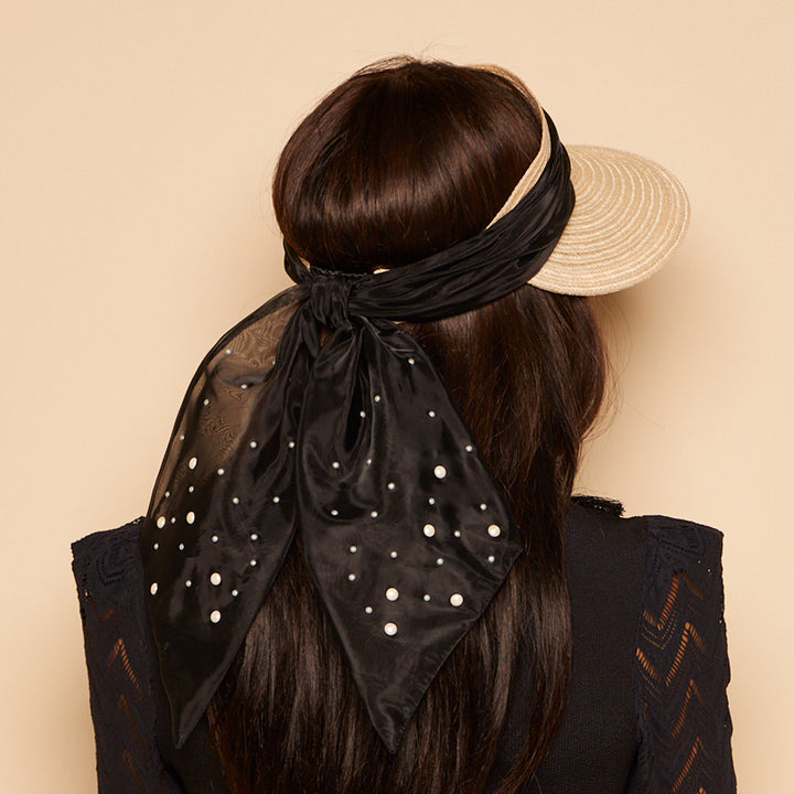 Back shot of Ricky visor in black organza with pearls