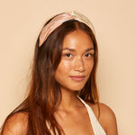 Side profile shot of Sally headband in blush/cream