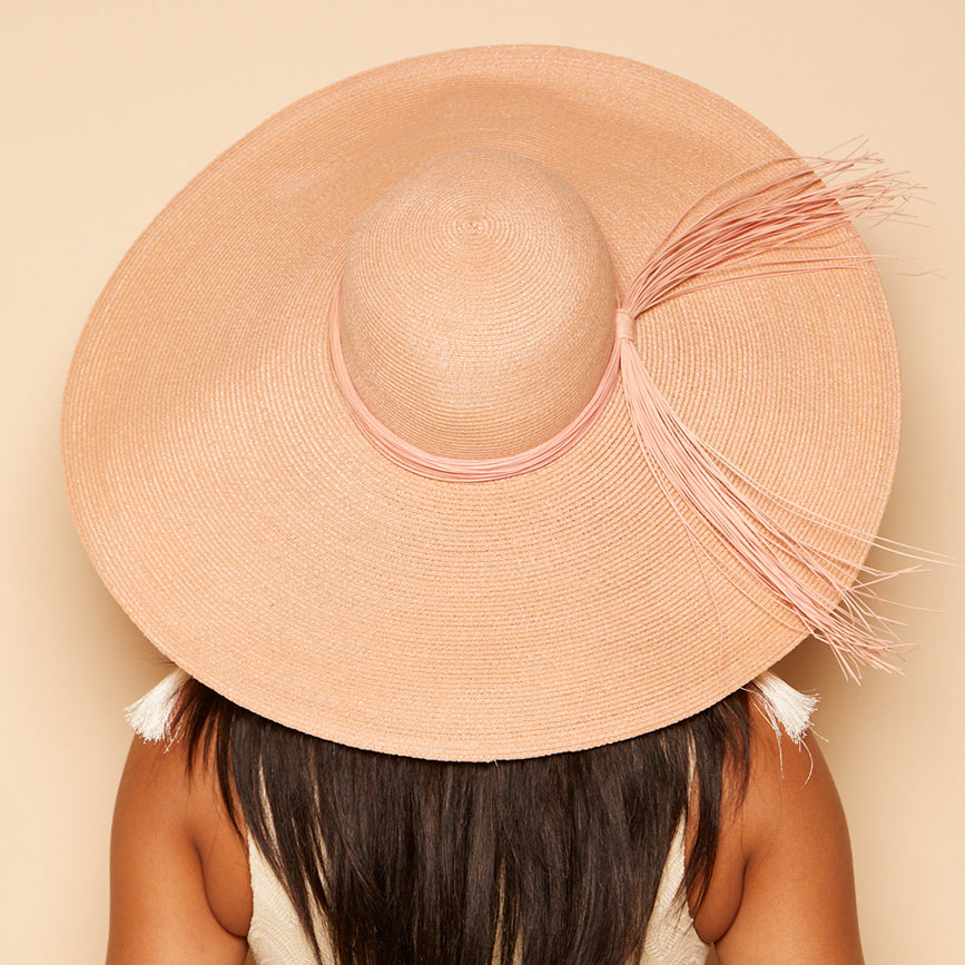 Back shot of Sunny in Peach