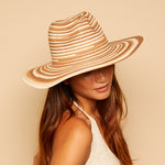 On-model shoot of Willa fedora in Ivory/camel/brown. 
